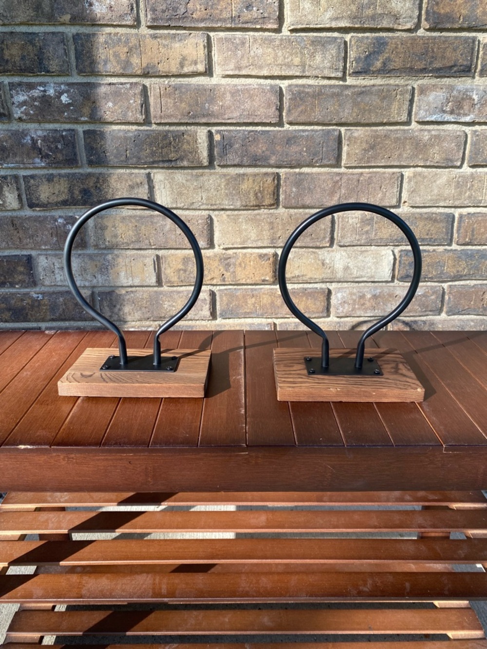 Pair of Rustic Black Metal Hoop Bookends on Wood Bases